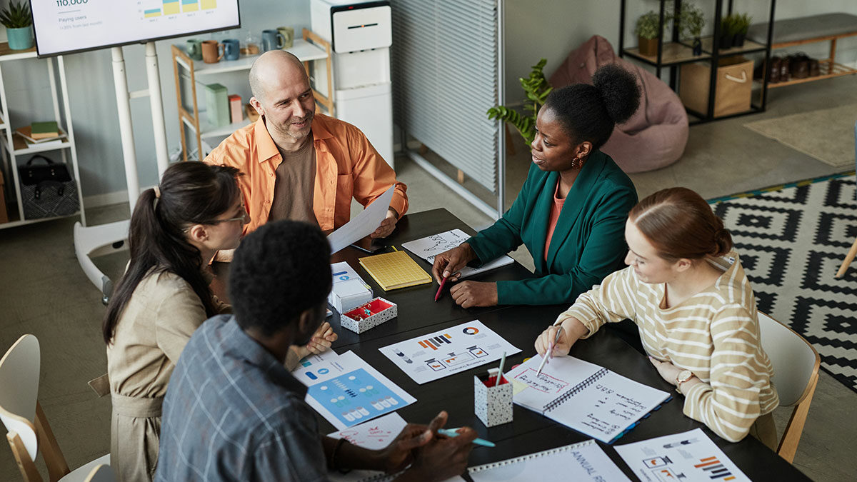 diverse-business-team-meeting-at-table-2023-11-27-04-49-47-utc