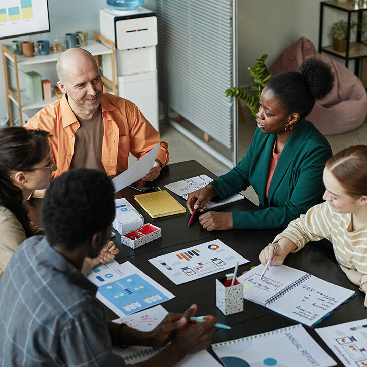 diverse-business-team-meeting-at-table-2023-11-27-04-49-47-utc